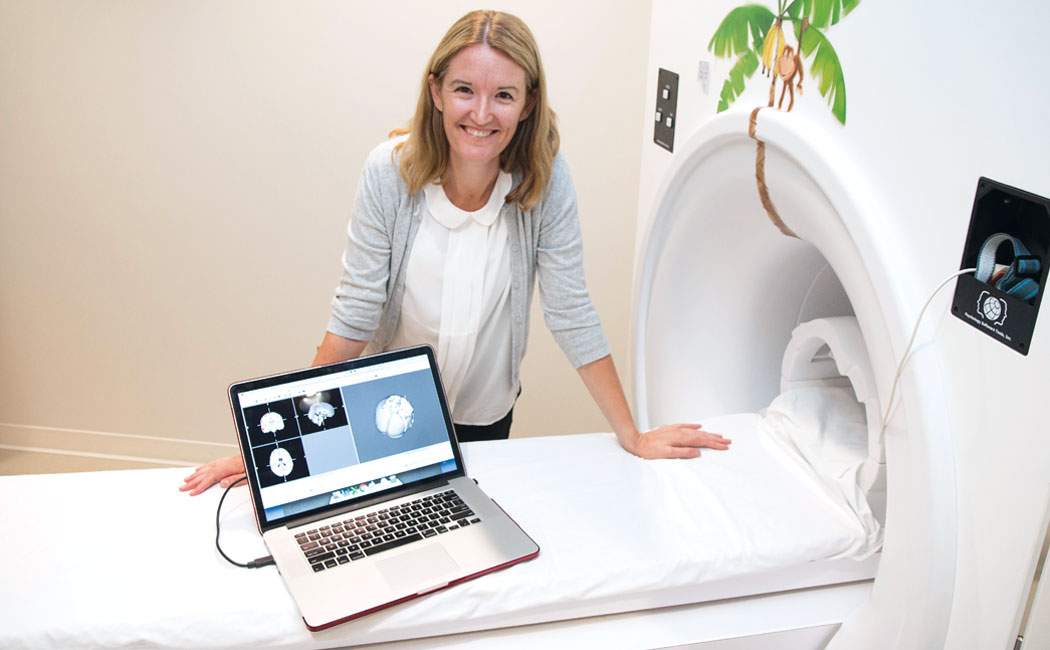 Carrie Clark, assistant professor of educational psychology, is using functional MRI technology to capture brain activity while children learn mathematics. 