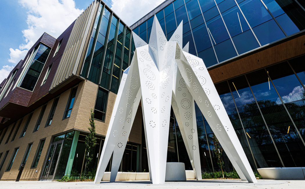 Exterior of Carolyn Pope Edwards Hall with sculpture.